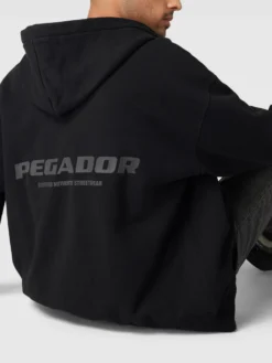 Pegador Oversized Sweatjacke Mit Label-Prints Modell 'Colne' - Schwarz 7 Pegador Oversized Sweatjacke Mit Label-Prints Modell 'Colne' - Schwarz -WELLENSTEYN Verkäufe 89b4qkpo9p2k2ia160pkahpi654lcjqm8d74ue288t0j4la7ah24qli78gplchq99l64acpm6d35cgac953mcoj46hi3ip34cko68p1k6ti68oj16comadhg6phjcopm6ks34p0 scaled